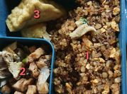 A picture of fried fish and rice
