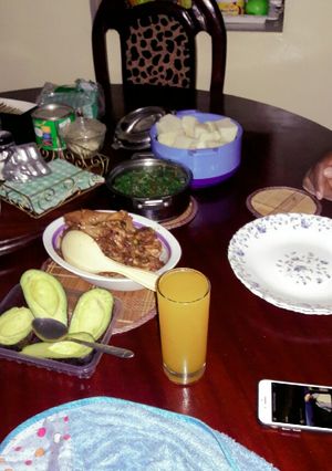 A picture of Wet fry kienyeji chicken with ugali.