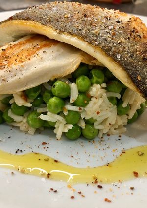 A picture of Sea Bass, Sambal Udang Bercili rice with peas.