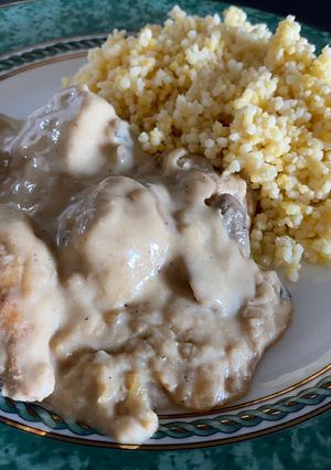 A picture of Chicken Blanquette with Beer.