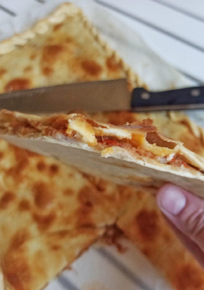 Una foto de Empanada (de carne mechada)