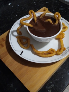Una foto de Chocolate a la Taza de Colacao con Mini-Churros