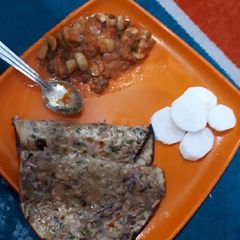 A picture of Mushroom and green Chole masala.