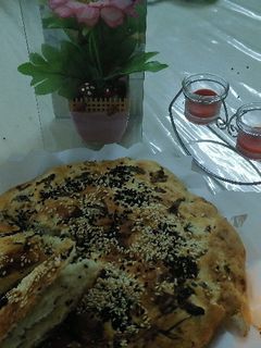 صورة لوصفة خبز النان بالحبة السودة والسمسم