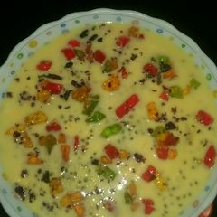 A picture of Mango falooda with chia sheeds.
