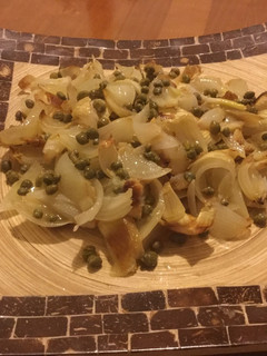 Una foto de Ensalada de cebollas asadas
