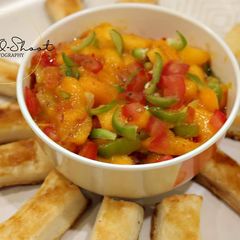 A picture of Mango salsa wd puff pastry sticks. #mangotango.
