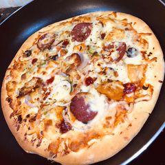 Homemade cheesy Pizza A picture of Homemade cheesy Pizza.