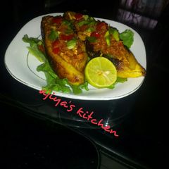 A picture of Pan baked stuffed plantain.