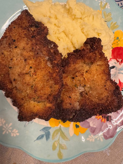 Una foto de Milanesa de Carne con Puré
