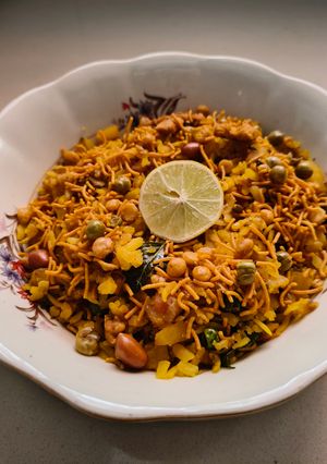 A picture of Vegetable Poha with Mangalorean Mixture.