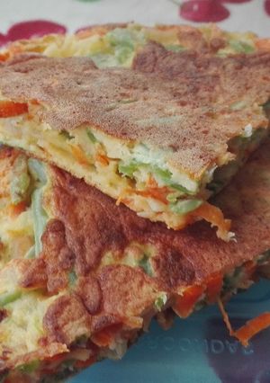 Una foto de Tortilla de zanahoria y poroto verde