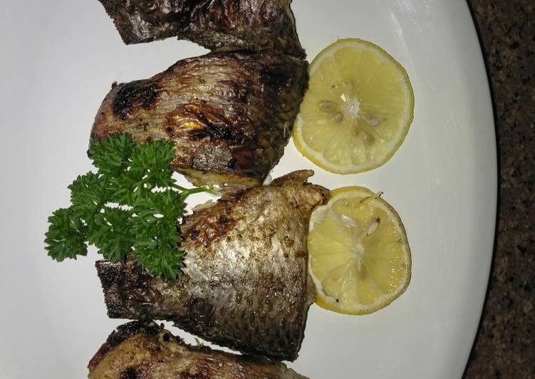 Steps to Make Super Quick Homemade Lemon,garlic and herbs roasted fish#4weekchallenge