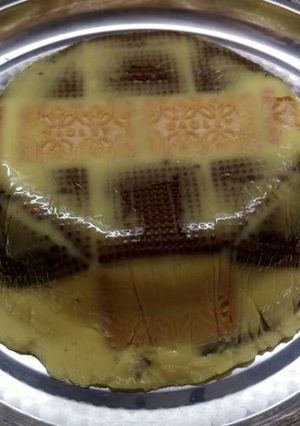 Una foto de Postre de vainilla con galletitas de chocolate y coco