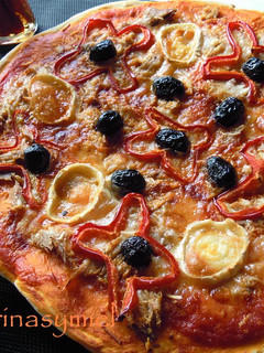 Una foto de Pizza de melva