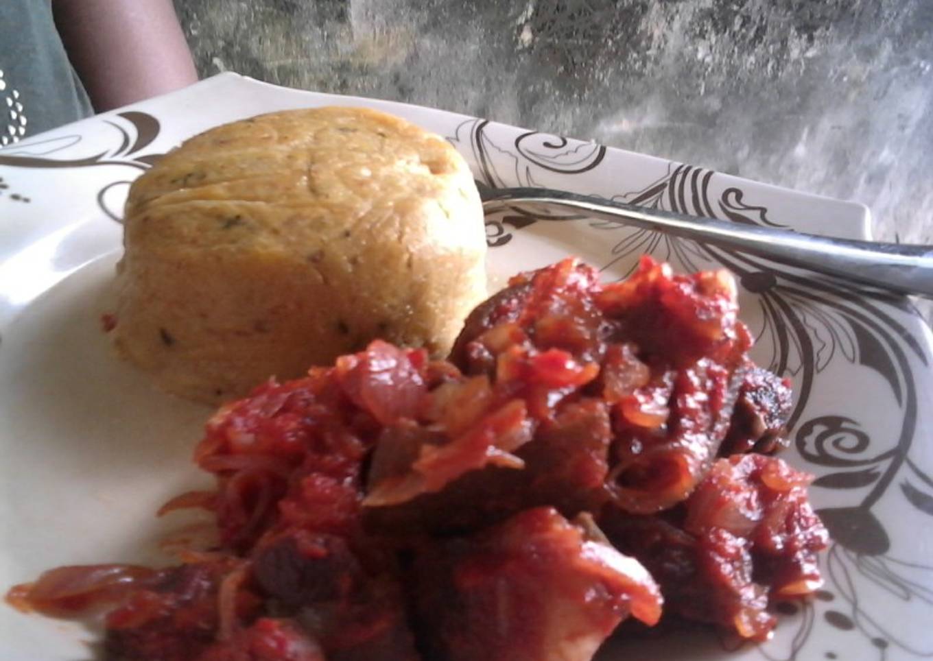 Fresh Corn pudding paired with Asun (peppered roasted goat meat