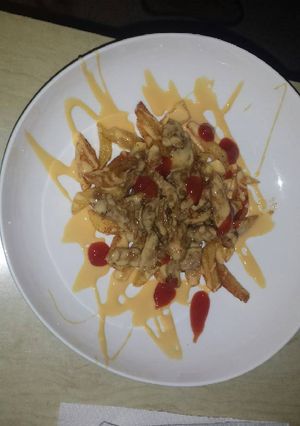 Una foto de Carne con papas