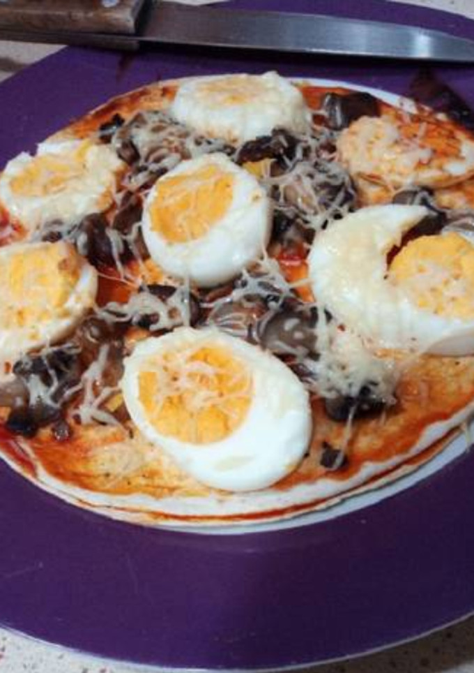 Una foto de Pizza de setas con fajitas