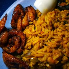 A picture of Jollof rice n beans.