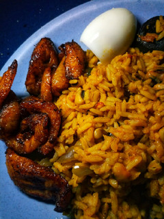 A picture of Jollof rice n beans.