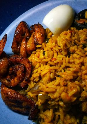 A picture of Jollof rice n beans.