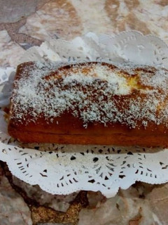 Una foto de Budín de coco relleno con dulce de leche