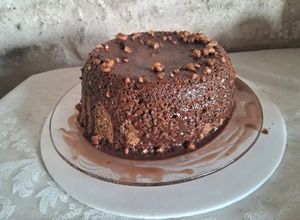 Una foto de Torta mágica con postre de chocolate en cajita