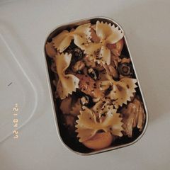 A picture of Farfalle (bow tie) Oyster Mushroom Pasta w/ olives & Tomato 🍅.