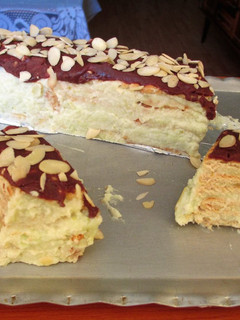 Foto principal de Tarta de galletas con crema de pistachos y coco rallado
