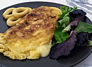 Una foto de Tortilla de jamón york y tranchetes