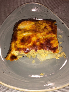 Una foto de Budín de papas con pesto