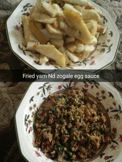 A picture of Fried yam and zogale egg sauce.