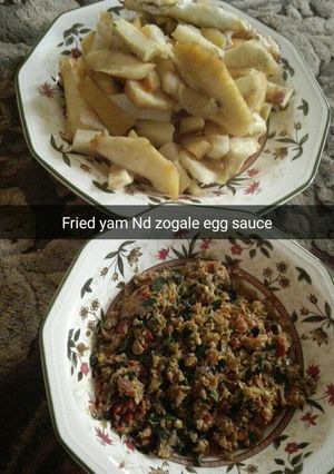 A picture of Fried yam and zogale egg sauce.