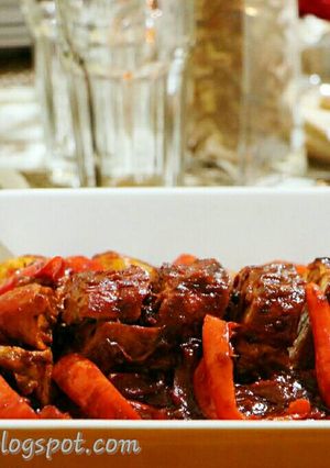 A picture of Pork Mechado Roll with a twist.