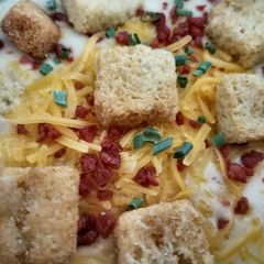 A picture of Loaded Cauliflower cheese soup.