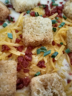 A picture of Loaded Cauliflower cheese soup.