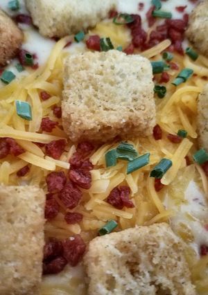A picture of Loaded Cauliflower cheese soup.