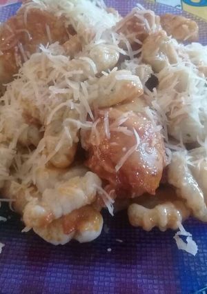 Una foto de Ñoquis de papa y queso