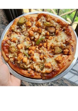 A picture of Homemade Veg Cheese Pizza.