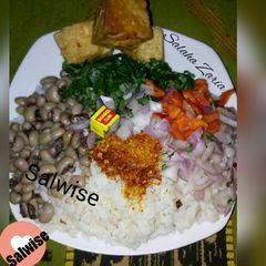 A picture of Spinach Garau-Garau(white rice & veggies).