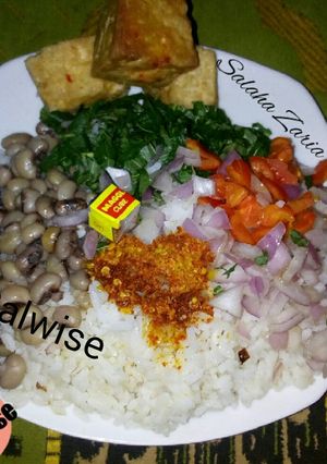 A picture of Spinach Garau-Garau(white rice & veggies).