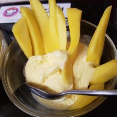A picture of My Mango dip sticks in Creamy Cornish Ice Cream. 😀.