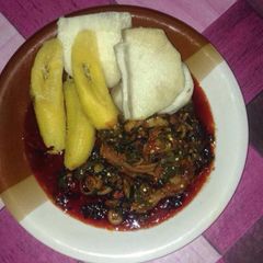 Boil yam and plantain with vegetable sauce A picture of Boil yam and plantain with vegetable sauce.