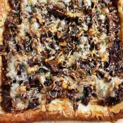 A picture of French Onion Steak & Mushroom Tart.