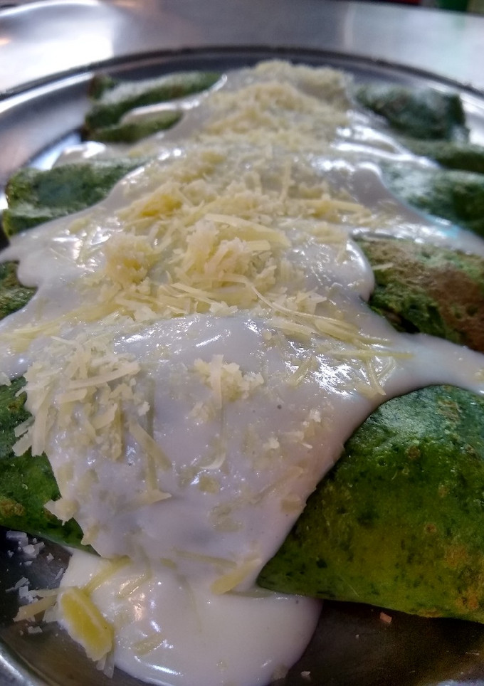 Una foto de Canelones de espinaca relleno de pollo