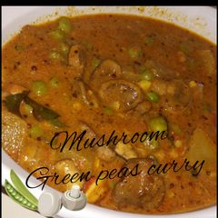 A picture of Mushroom Green peas curry.