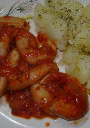 Una foto de Chinchulines con salsa a la cacerola