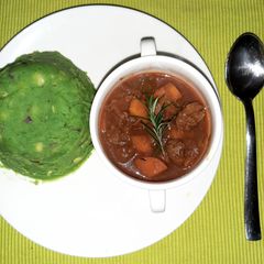 Mokimo served with beef stew A picture of Mokimo served with beef stew.