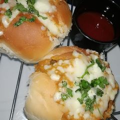 Cheesy butter bhaji masala stuffed pav A picture of Cheesy butter bhaji masala stuffed pav.