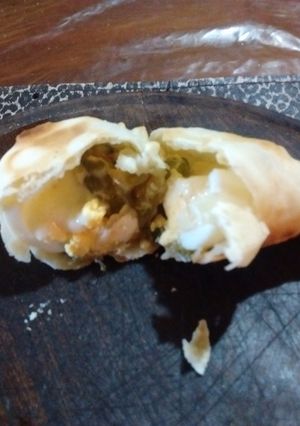 Una foto de Empanadas de zapallito verde al parrigas
